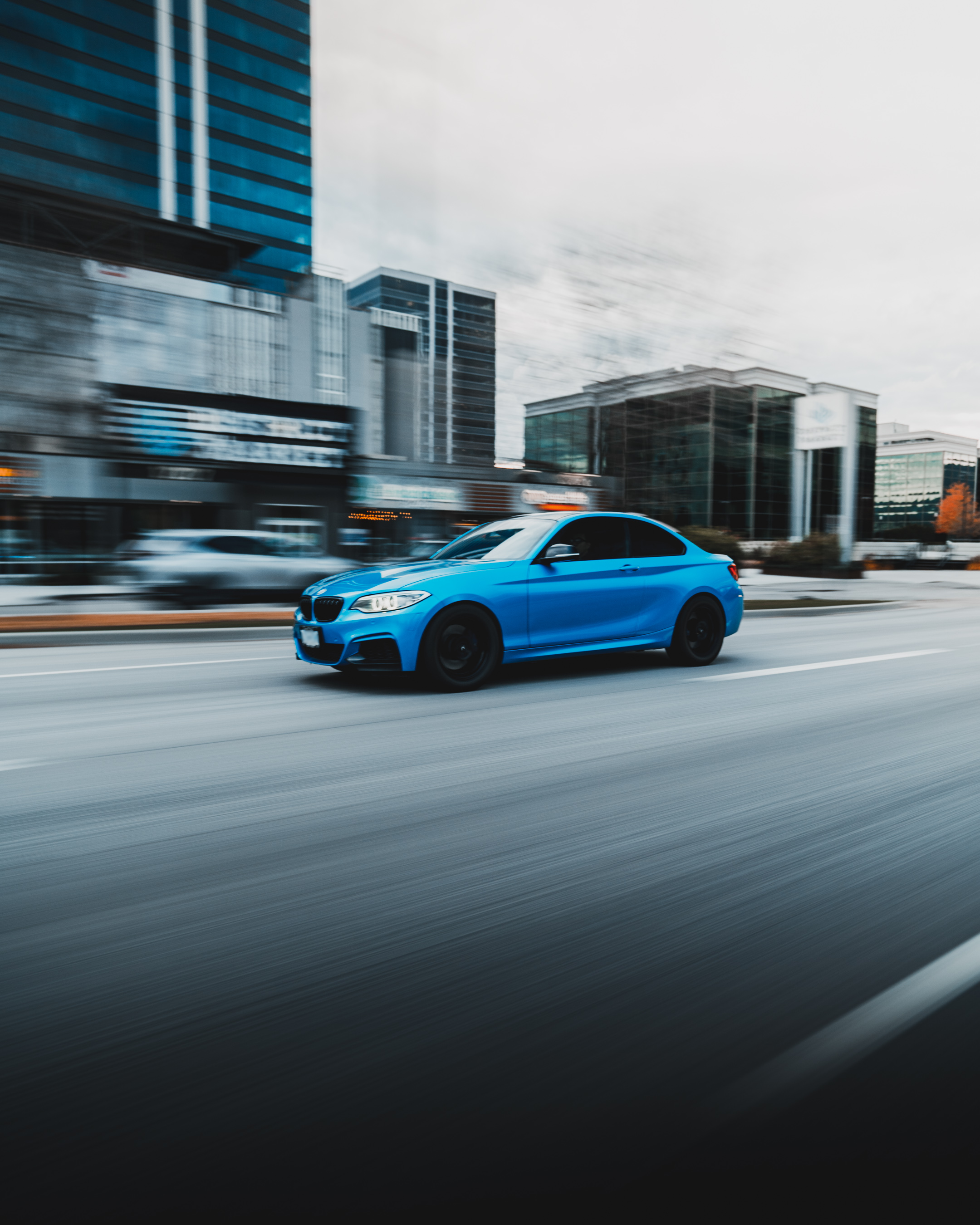 2016 Blue BMW 2 series front driving Kelowna fall