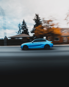 2016 Blue BMW 2 series side driving Kelowna